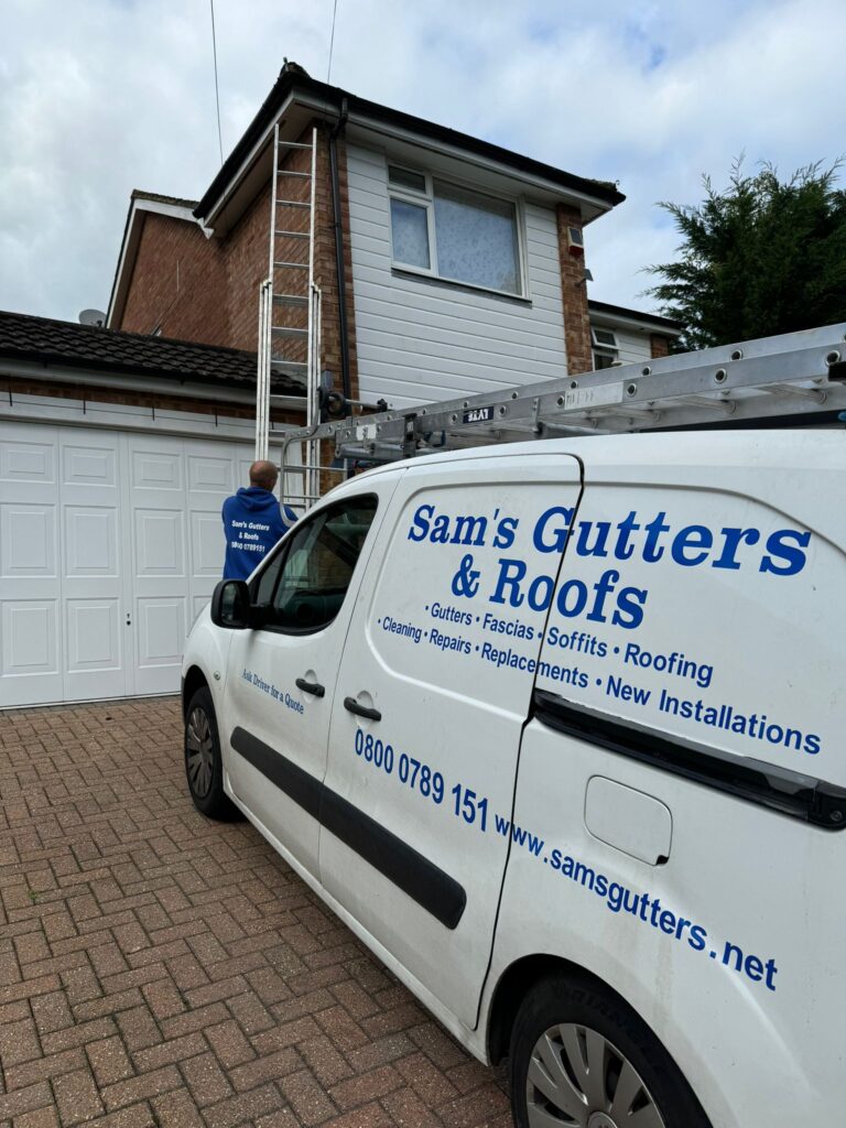 Technician's van parked in front of the house